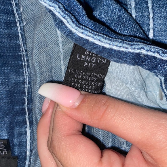 dark-washed boot cut jeans. - Picture 4 of 4